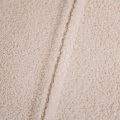 Detal na ukryty zamek w legowisku dla psa, tkanina boucle, kolor chałwa (kremowy). Nowoczesna, wysokiej jakości tkanina boucle z certyfikatami bezpieczeństwa.